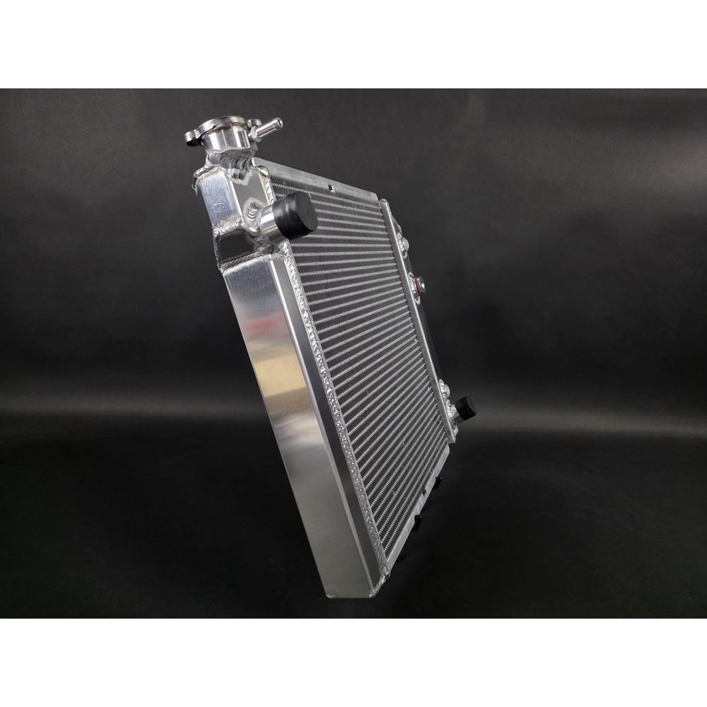 Radiateur alu R11 turbo epaisseur 36mm conforme origine vue de profil avec goulot et soudures TIG