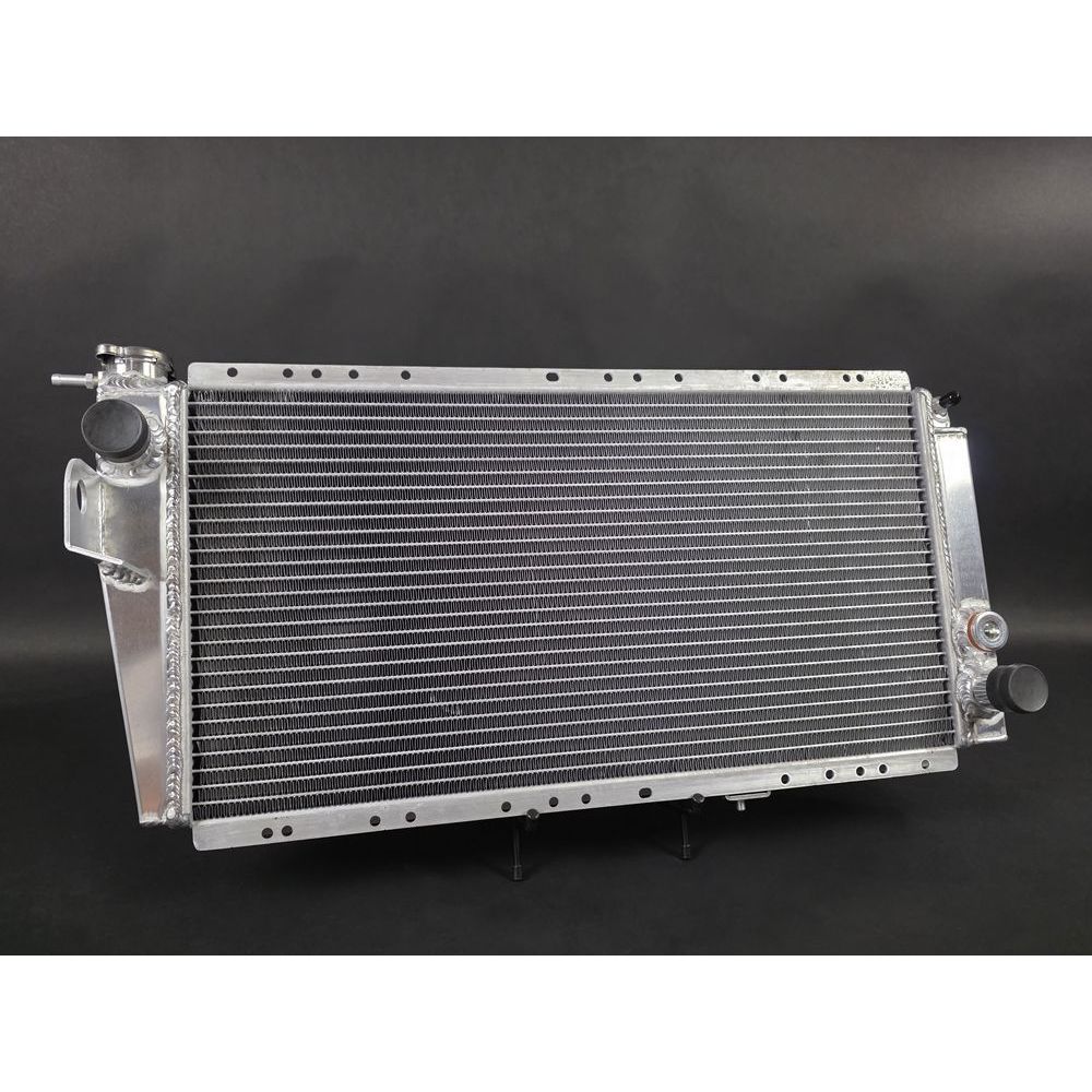 Radiateur eau tout aluminium soude TIG avec bandeaux de fixation ajoures Renault 5 Alpine Turbo JAS Engineering